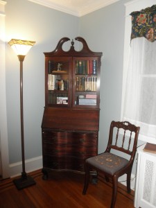 secretary with antique books, purchased and already owned